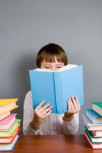 Photo: Boy Reads a Book, Elena Blokhina / Shutterstock Elena Blokhina / Shutterstock