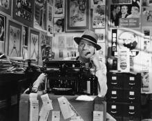 Photo: Man thinking at typewriter, Everett Collection / Shutterstock