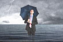Business man underwater, Minerva Studio / Shutterstock.com Business man underwater, Minerva Studio / Shutterstock.com