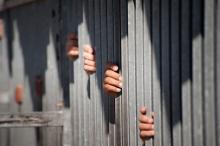 Palestinian men seeking access to Jerusalem at a checkpoint in August 2012. Ryan Rodrick Beiler / Shutterstock.com Ryan Rodrick Beiler / Shutterstock.com