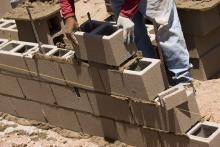 Cinder brick laying, Lou Oates / Shutterstock.com Cinder brick laying, Lou Oates / Shutterstock.com