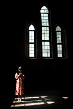 Woman in church, fztommy / Shutterstock.com Woman in church, fztommy / Shutterstock.com