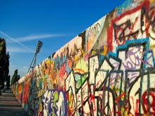 Ruins of the Berlin Wall remain today. Photo via aldorado/shutterstock.