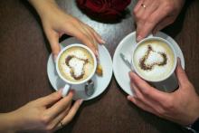 Married couple with coffee mugs. Photo courtesy Hot Photo Pie/shutterstock.com