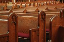 Church pews. Photo via James Steidl / Shutterstock.com Photo via James Steidl / Shutterstock.com