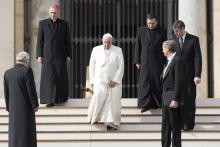 Pope Francis greets the pilgrims.