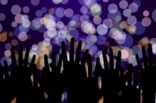 Hands streteched toward lights, pukach / Shutterstock.com Hands streteched toward lights, pukach / Shutterstock.com