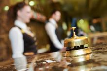 An inn's reception counter with bell. Image courtesy Dmitry Kalinovsky/shutterstock.com. An inn's reception counter with bell. Image courtesy Dmitry Kalinovsky/shutterst