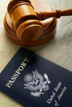"Judges court gavel and US passport." zimmytws / Shutterstock zimmytws / Shutterstock
