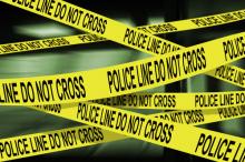 Police crime scene tape,  Luis Louro /Shutterstock.com
