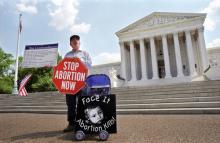 Anti-abortion protestor in front of Supreme Court, Ryan Rodrick Beiler / Shutterstock.com Ryan Rodrick Beiler / Shutterstock.com