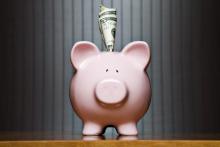 Piggy bank with money sticking out, Kinetic Imagery / Shutterstock.com Piggy bank with money sticking out, Kinetic Imagery / Shutterstock.com
