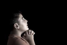 Portrait of a boy praying, Emin Ozkan / Shutterstock.com Portrait of a boy praying, Emin Ozkan / Shutterstock.com