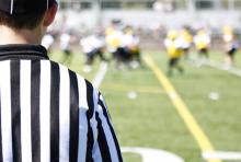 Referee on the field, Peter Kim / Shutterstock.com Referee on the field, Peter Kim / Shutterstock.com