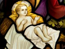 Photo: Stained glass image of baby Jesus, © Jurand / Shutterstock.com Photo: Stained glass image of baby Jesus, © Jurand / Shutterstock.com