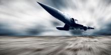 Military plane, Andrey Yurlov/ Shutterstock.com