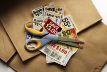 Photo: Clipping coupons, Jim Barber  / Shutterstock.com