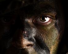 Soilder's face, Aaron Amat/Shutterstock.com