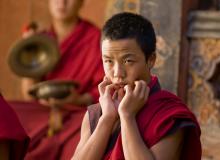 Monks rehearsing for the Jakar tsechu which is held the next day on Oct. 23, 2010 in Jakar. Wouter Tolenaars / Shutterstock.com Wouter Tolenaars / Shutterstock.com