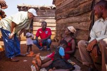 Fred Luter, left, visits with villagers in Uganda on May 28. Photo courtesy International Mission Board Photo courtesy International Mission Board