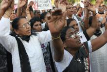 Women protest in Ahmedabad, Gujarat, after a nun was raped in Kolkata, West Bengal. Photo via Arielle Dreher / RNS Photo via Arielle Dreher / RNS