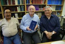 Inuktitut Bible translators flank director of scripture translation for the Canadian Bible Society. RNS photo by Ron Csillag RNS photo by Ron Csillag