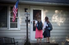 Sister Moody (Left) and Sister Ray speak with a Kansas City, Mo., resident on Sept. 10, 2013. RNS photo by Sally Morrow