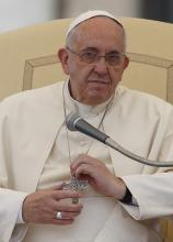Pope Francis holds his pectoral cross. Photo via Paul Haring / Catholic News Service / RNS. Pope Francis holds his pectoral cross. Photo via Paul Haring / Catholic News Se