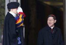 Cardinal Luis Antonio Tagle, right. Photo via REUTERS / Alessandro Bianchi / RNS Photo via REUTERS / Alessandro Bianchi / RNS