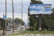 A billboard reading “God Loves Gays" went up on Sept. 8, 2014 in Topeka, Kan. Photo via Sally Morrow/RNS.