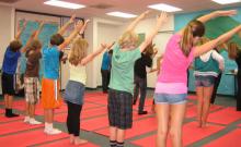 Children practice yoga at El Camino Creek Elementary School in Carlsbad, Calif. Photo courtesy RNS. Photo courtesy RNS.
