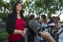 Cindy Lee Garcia speaks to reporters after a court hearing in 2012. Photo via REUTERS / Bret Hartman / RNS Photo via REUTERS / Bret Hartman / RNS