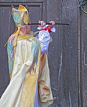 New Bishop of Durham knocking on door at Saturday's ceremony. Image from durham.