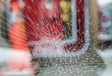 Broken glass that looks like a spider web.