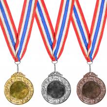 Gold, silver, and bronze medals. Image Source / Getty Images