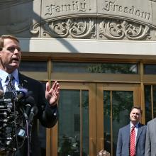 Perkins speaks to reporters outside FRC's headquarters in Washington, D.C.