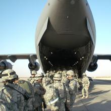 U.S. troops head to Iraq, 2006. Image via Wiki Commons http://bit.ly/w1FpAB