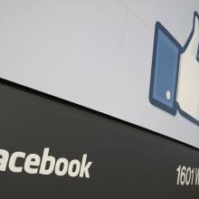 Sign at the entrance of Facebook HQ, Menlo Park, CA. Photo via Getty Images. 