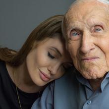 Angelina Jolie with Louis Zamperini. Photo courtesy of Universal / RNS.