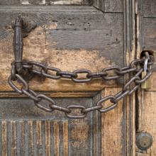 Locked church doors. Photo courtesy vesilvio/shutterstock.com
