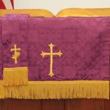 Church pulpit with flag behind, Christina Richards / Shutterstock.com