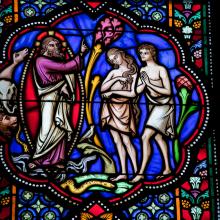Stained glass window depicting Adam & Eve, jorisvo / Shutterstock.com