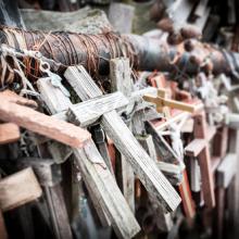 Crosses gathered for mourning. Photo courtesy Konstantin Yolshin/shutterstock.co
