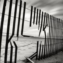 Broken fence. Image courtesy mervas/shutterstock.com