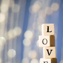 Blocks spelling 'love.' Gita Kulinitch Studio / Shutterstock.com
