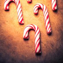 Candy canes on a table. Image courtesy Wilson Araujo/shutterstock.com