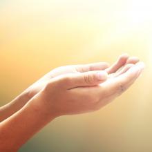 Hands in gratitude. Image courtesy CHOATphotographer/shutterstock.com