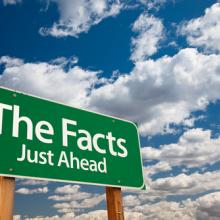 Just the Facts signage, Andy Dean Photography / Shutterstock.com