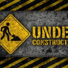 Under construction sign, L.Watcharapol / Shutterstock.com