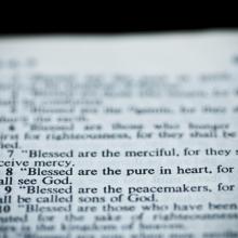 Bible opened to the sermon on the mount, Vibe Images/ Shutterstock.com